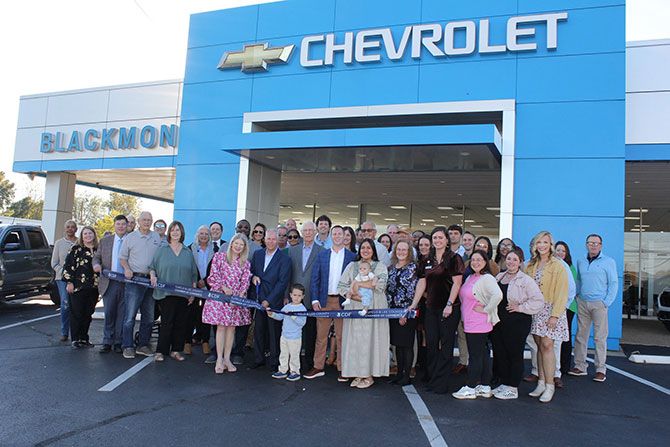 Cutting ribbon outside Blackmon Chevrolet